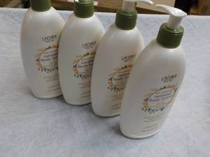 lot 196 image: 4 Lacura 18 oz Bottles Oatmeal Body...