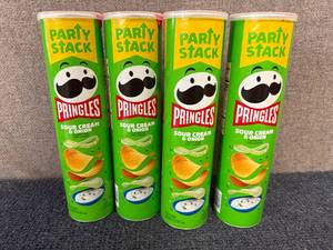 lot 167 image: 4 Cans of Sour Cream And Onion Pringles