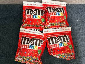 lot 207 image: 4 Bags Of Mini Peanut Buttter M&MS