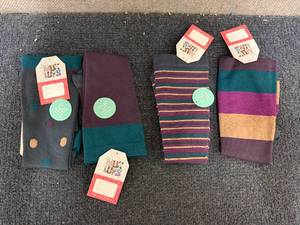 lot 301 image: 4 Pairs Of Jeweled Muk Luks Socks