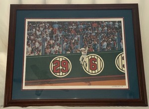 lot 13 image: Kirby Puckett Amazing Metrodome Catch Limited Edition 600 Artist Signed Lithograph by Bill Purdom 38x30 Framed and Matted Minnesota Twins Baseball