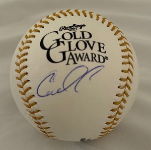 lot 59 image: Carlos Correa Autographed Gold Glow Award Rawlings Official Baseball Minnesota Twins