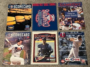 lot 105 image: (6) Joe Mauer and Minnesota Twins Baseball Scorecards  Calendar  Magazines