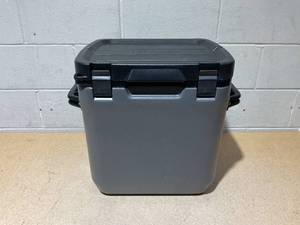 lot 203 image: Stanley Adventure Outdoor Cooler 30 qt  Heavy Duty Outdoor Camping Cooler with Easy Carry Side Handles  4 Days Cooling Ice Chest for 40 Cans  Flat Top Doubles as Seat  BPA-Free  Charcoal