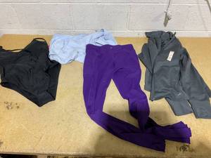 lot 147 image: LOT OF 4 Womens One Piece Swimsuit, Legging, Short, & Zip Up Size XL