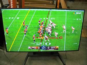 lot 61 image: 80 Sharp LC-80LE661U Full HD Commercial Smart LED TV with line through the display