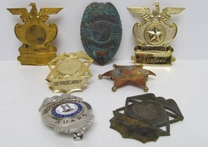 lot 54 image: Group of Assorted Vintage Metal Badges