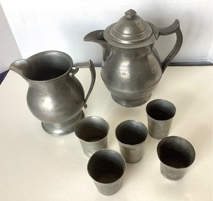 lot 2 image: Pair of Antique and Vintage Pewter Pitchers  Set of 5 Cups