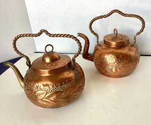 lot 37 image: Pair of Vintage Chased Copper and Brass Teapots
