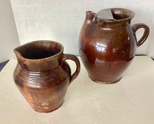 lot 87 image: Pair of Antique Rockingham Pitchers