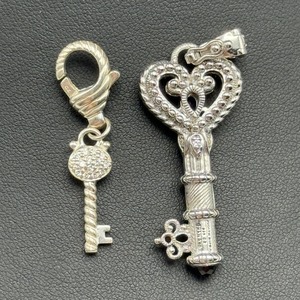 lot 7 image: Judith Ripka .925 Key Pendants
