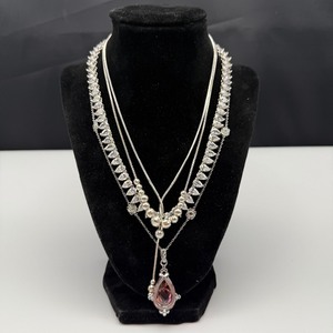 lot 61 image: Four Sterling Silver Necklaces