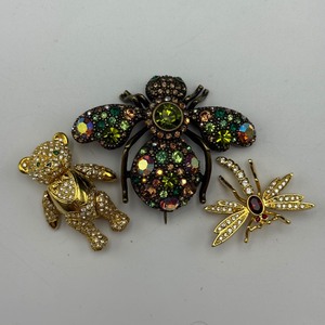 lot 84 image: Joan Rivers Brooch Trio