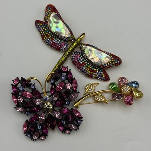 lot 85 image: Joan Rivers Multicolor Brooch Trio