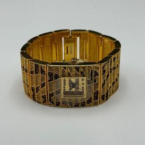 lot 179 image: Limited Edition Couture Watches by Adrienne  Gold Leopard Cuff Watch
