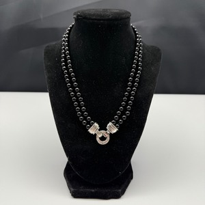 lot 186 image: Black Bead Double-Strand Necklace with Silver-Tone Horsebit Pendant