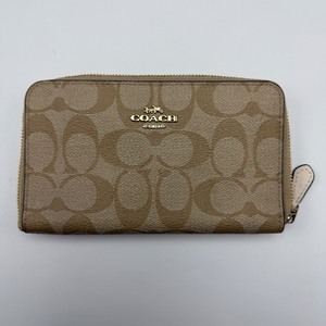 lot 195 image: Coach Signature Zip-Around Wallet