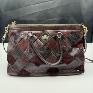 lot 201 image: Coach Patchwork Burgundy Satchel  Rich Texture & Timeless Elegance