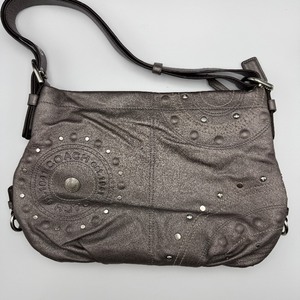 lot 206 image: Coach Metallic Studded Crossbody Bag