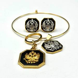 lot 113 image: Joan Rivers Gold-Tone Choker, Key Chain & Earrings Set