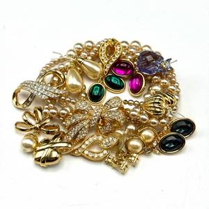 lot 100 image: Nolan Miller Costume Jewelry Lot  Necklace, Three Pairs of Earrings, and Pendants