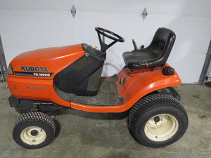 lot 12 image: Kubota TG1860G Lawn Tractor with Multiple Attachments