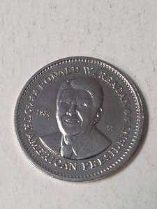 lot 70 image: &nbspRonald Reagan 1984 AA Double Eagle Presidential Commemorative Silver Plated Coin - Unc.