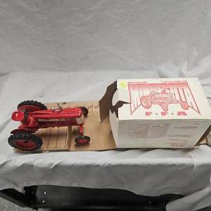 lot 107 image: 1995 FFA 3rd Edition 116 Farmall 350 Special Edition, As New in Box