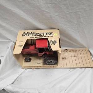 lot 108 image: Ertl 5288 International Tractor 116 Scale in Original Box