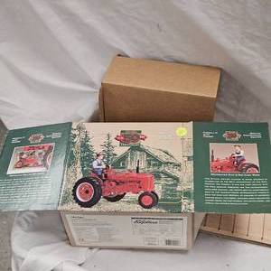 lot 109 image: 1995 Ertl , As New in Box, 50th Anniversary Farmall H with Cast Iron Farmer and Collector Card, 1945-95 Limited Rare Production