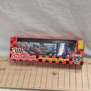 lot 116 image: Racing Champions 164 Tide Semi and Trailer, As New
