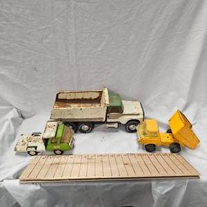 lot 101 image: 1960s Nylint Dump Truck and 1960s Tonka Camper Truck and Dump Truck