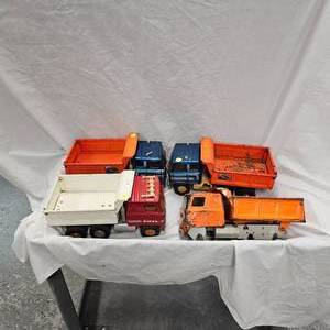 lot 73 image: 4-Ertl Auto Dump Dumptrucks