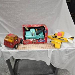 lot 89 image: 1979 Tonka Plane, Tonka Tractor and Disney Tomater Wrecker