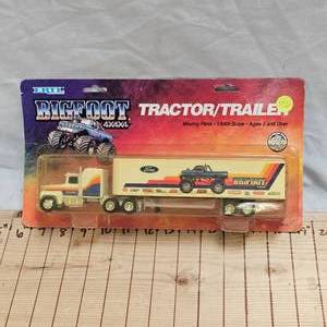 lot 126 image: 1990 Ertl Original Big Foot Monster Truck Transport, as new
