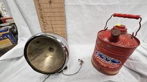lot 5 image: Antique Car HeadlightDelpho 1 Gallon Gas Can in Nice Condition