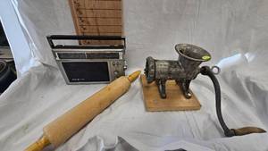 lot 35 image: Vintage Meat Grinder, Wood Rolling Pin, GE Transformer Radio