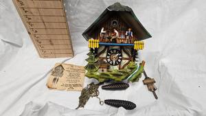 lot 38 image: Black Forest Schmedenbecher Clock Factory Cuckoo Clock, 1970s. still in same import Box