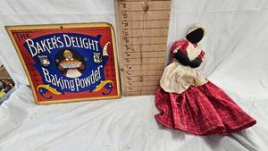 lot 82 image: Bakers Delight Baking Powder Vintage Cardboard Ad and Faceless Mammy Doll
