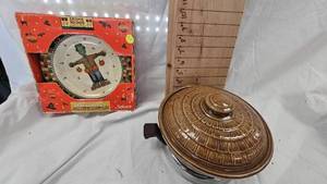 lot 47 image: Debbie Mumm Halloween Plates and McCoy Honeycomb Bean Pot