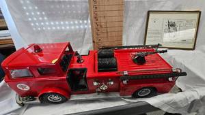 lot 11 image: Texaco Fire Engine, Great Condition wbox, Info on Instructions Framed