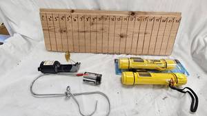 lot 111 image: Handheld Vexilar Depth Finder and Decoy Teaser with Battery