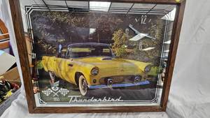 lot 10 image: Thunderbird Clock in Wood Frame, works