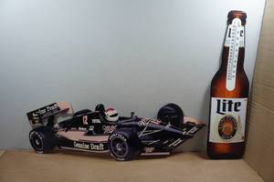 lot 20 image: Miller Beer Race Car and Thermometer Signs