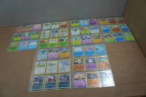 lot 95 image: Pokemon Cards - Holos