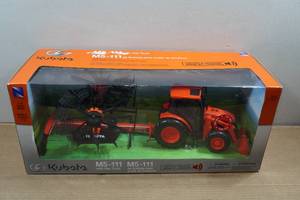 lot 104 image: Kubota Toy Tractor and Trailer
