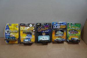 lot 164 image: Jada Toys Die Casts - Volkswagen Bus, Beetle, Chevy Suburban, Bel Air