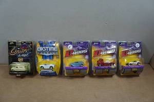 lot 166 image: Jada Toys Die Casts - Chevy, Suburban, Shelby, Ford COE, Pickup