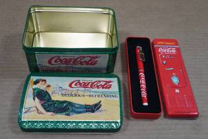 lot 198 image: Coca-Cola Collectors Tins and Pen
