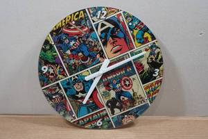 lot 285 image: Marvel Comics 14.5 Glass Clock